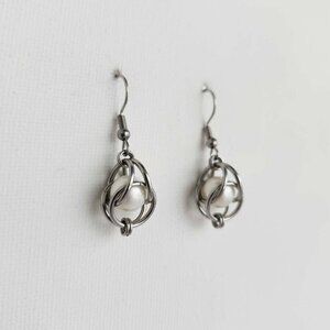 Long silver and pearl earrings
